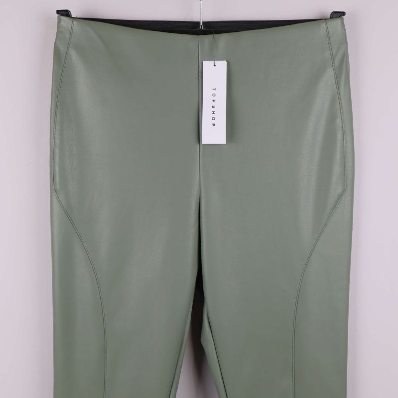 Fuskläderbyxor i grönt med etikett i midjan