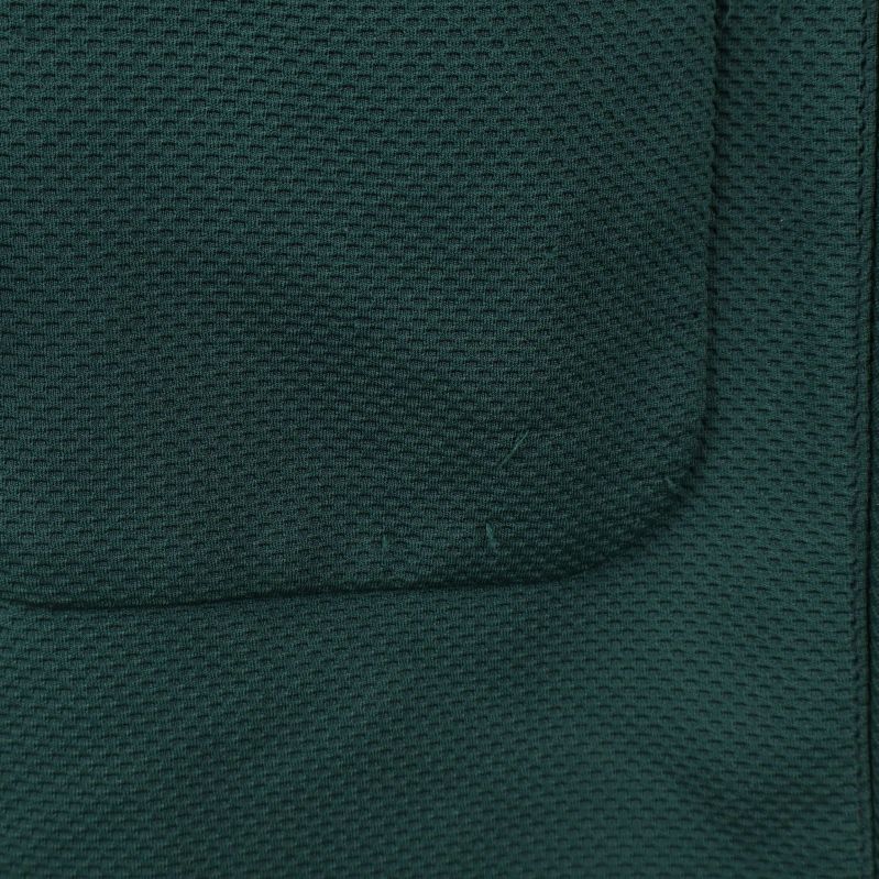 Materiallapp som visar polyester och elastan