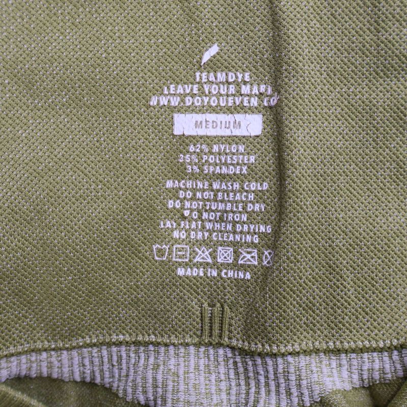 Tvätt- och materialinformation insida leggings