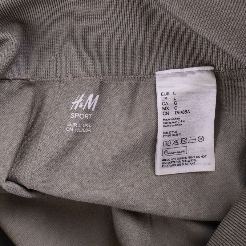 H&M sportlogga och tvättråd inuti tights