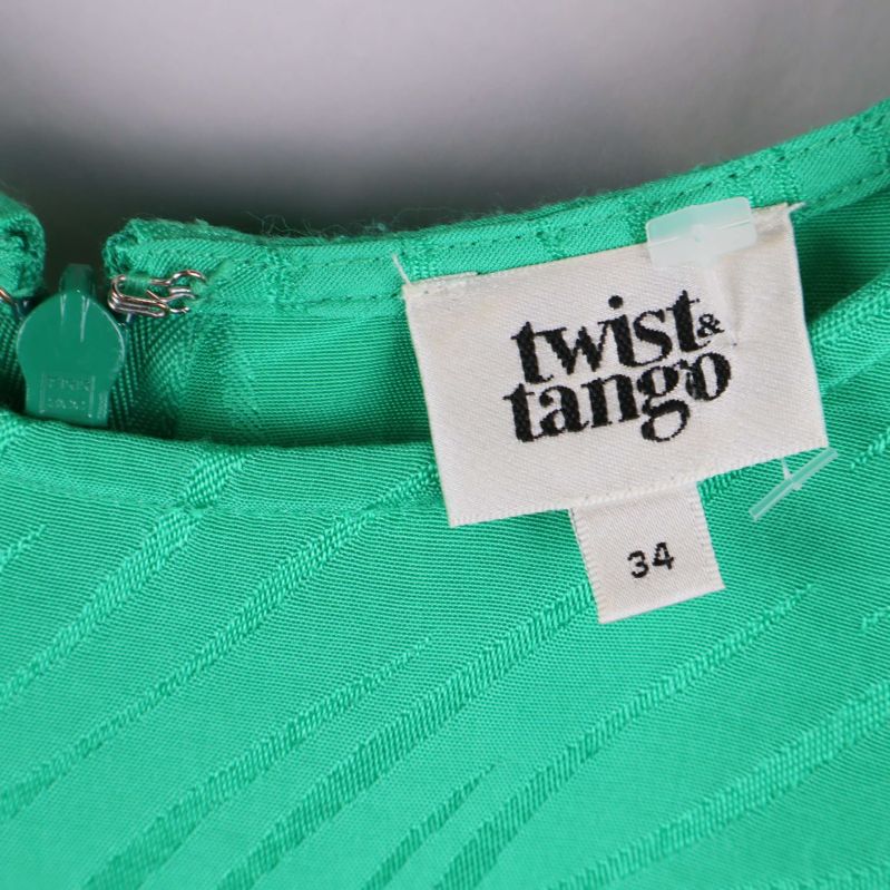 Twist & Tango logotyp och storlek 34 på etikett