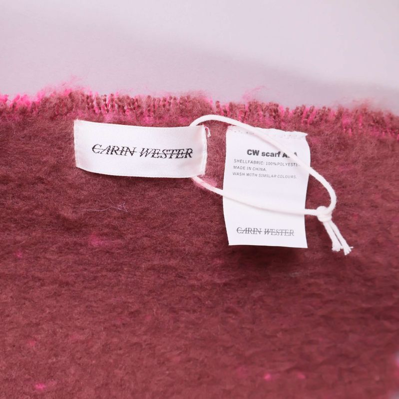 Närbild på Carin Wester märkning och tvättråd