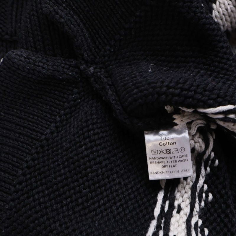 Materiallapp visar 100 procent bomull