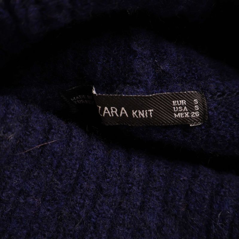 ZARA KNIT etikett på insidan av plagget
