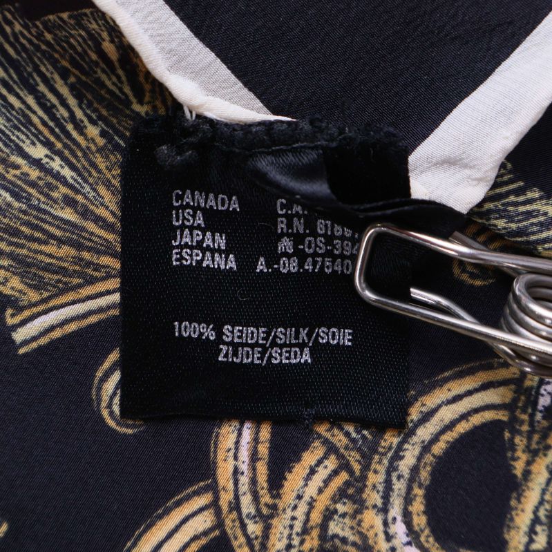 Materiallapp som visar 100% siden på insidan av scarfen