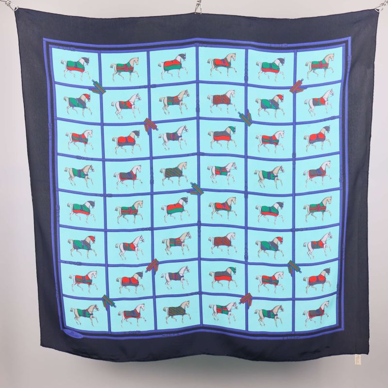 Flerfärgad scarf med hästar och grafisk kant