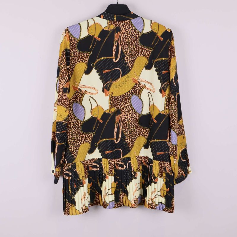 Tunika med grafiskt mönster i svart och gula toner, baksida