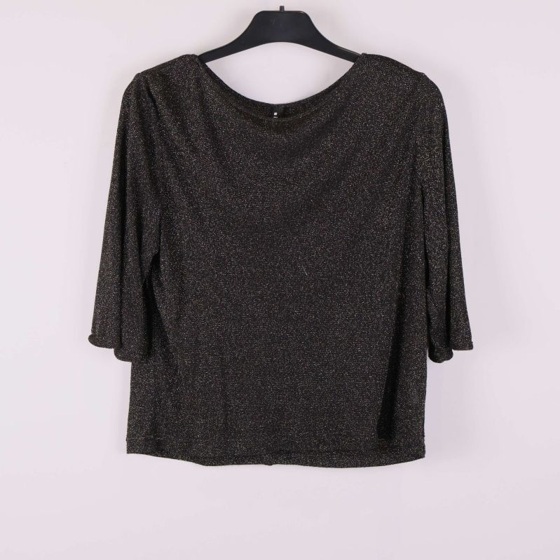 Framsida av svart glittrig topp på galge