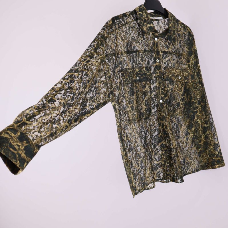 Transparent skjorta med mönster, ärm utsträckt