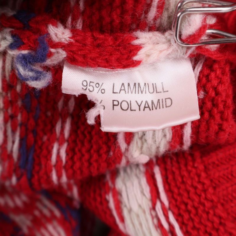 Materiallapp visar 95% lammull och polyamid