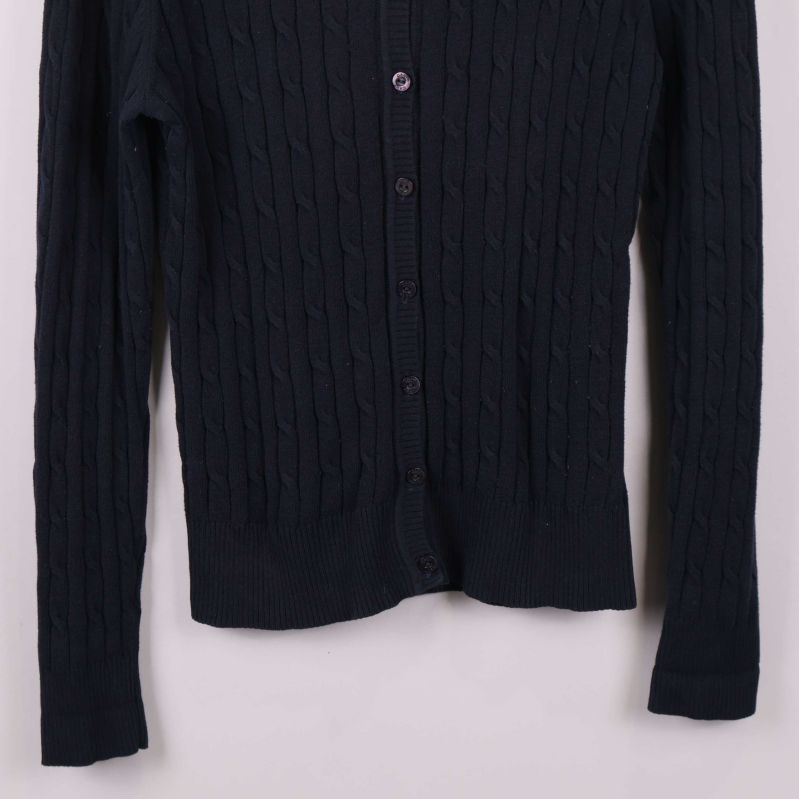 Nedre delen av kabelstickad cardigan med ribbad kant