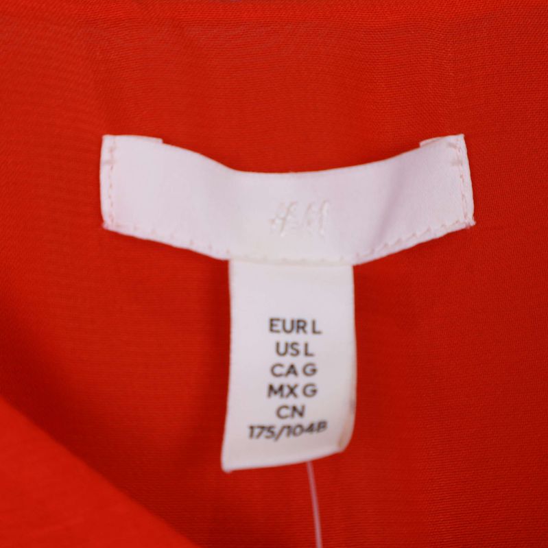 Baksida med knytband