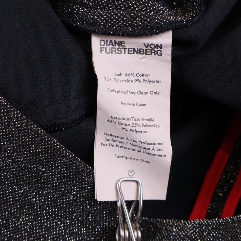 Materiallapp visar materialinnehåll i klänning