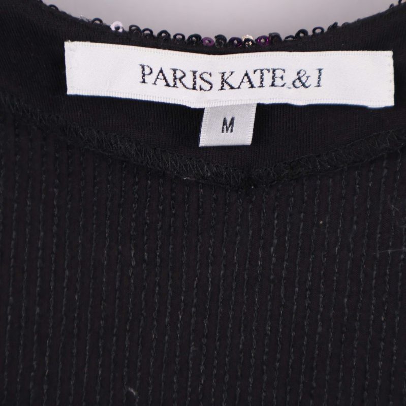 Närbild på etikett Paris Kate & I och storlek M