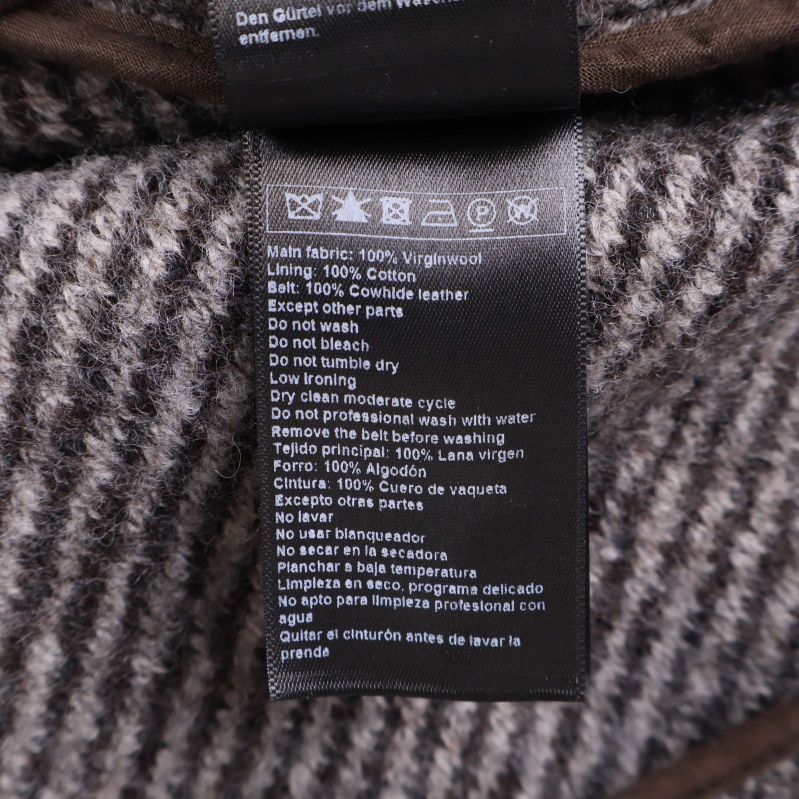 Materialetikett med information om huvudmaterial och foder