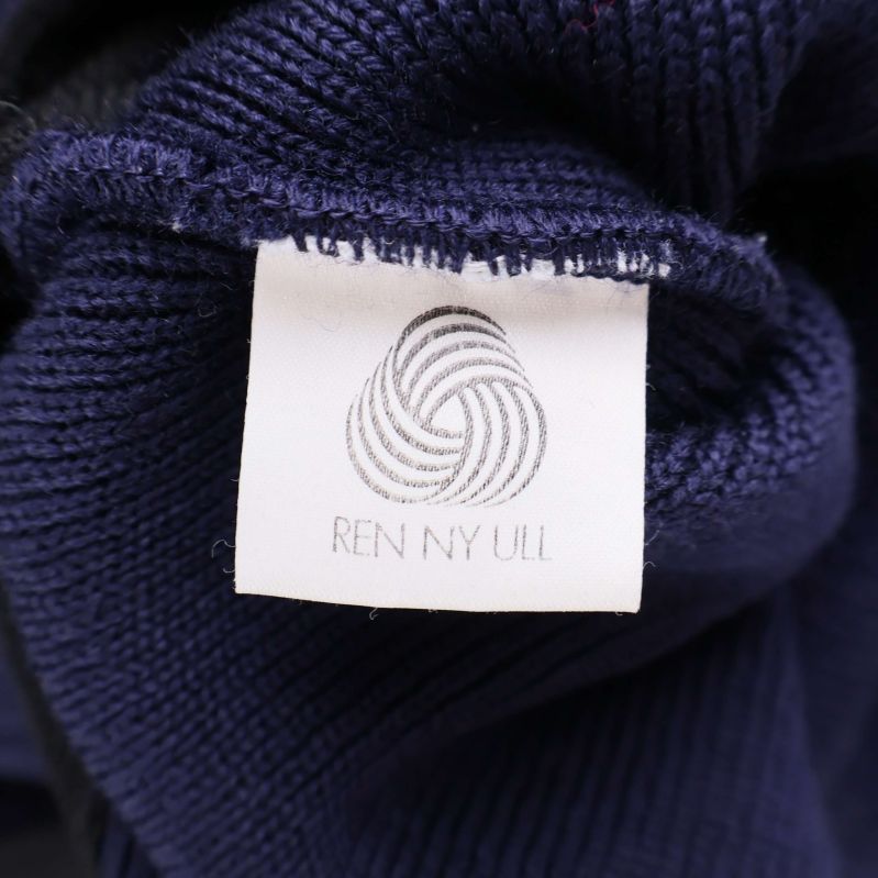 Materiallapp med text ren ny ull inuti plagget