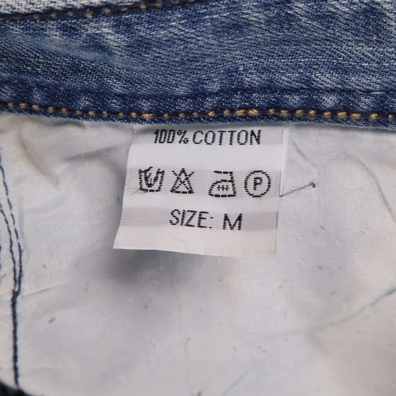 Tvättlapp med materialinfo: 100% bomull och storlek M