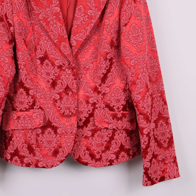 Kavajens högra sida och ärmslut med mönster