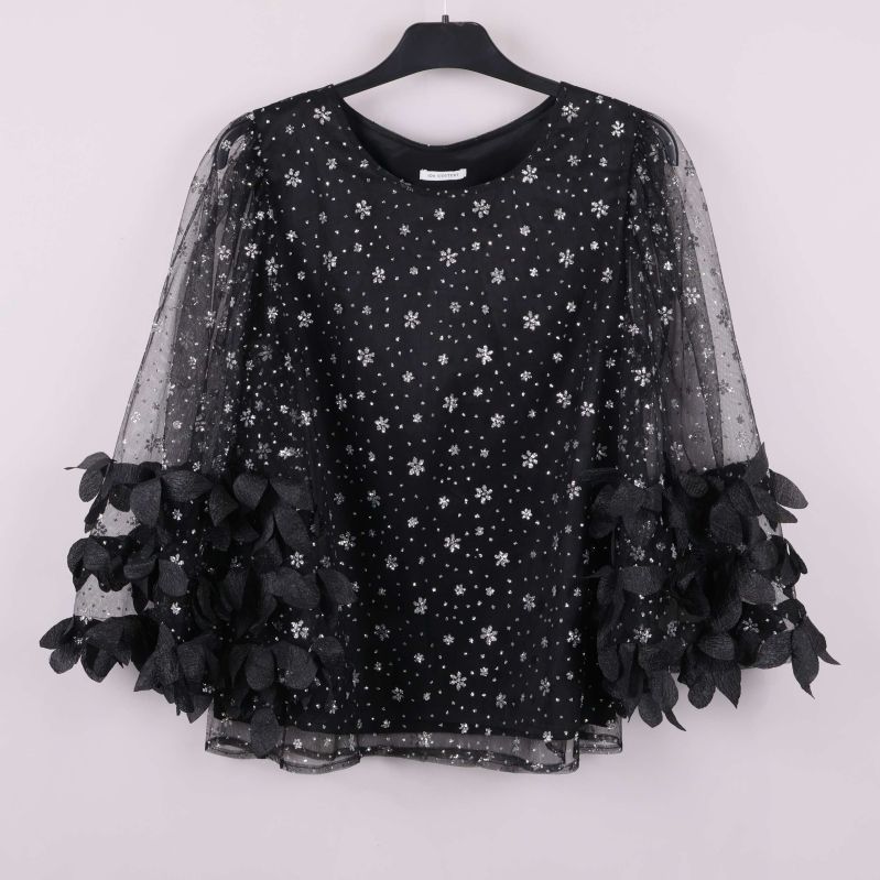 Svart topp med paljetter och vida ärmar