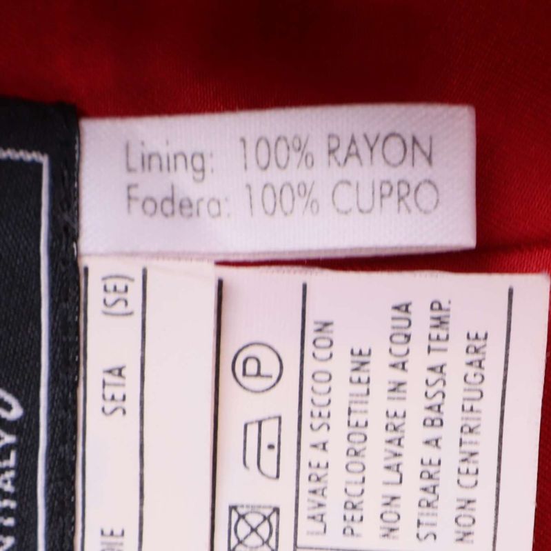 Detaljerad materiallapp visar foder i rayon och cupro