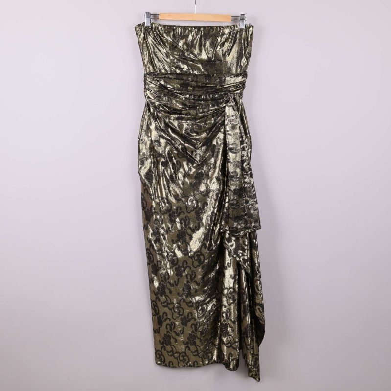 Glittrig maxiklänning med drapering framifrån