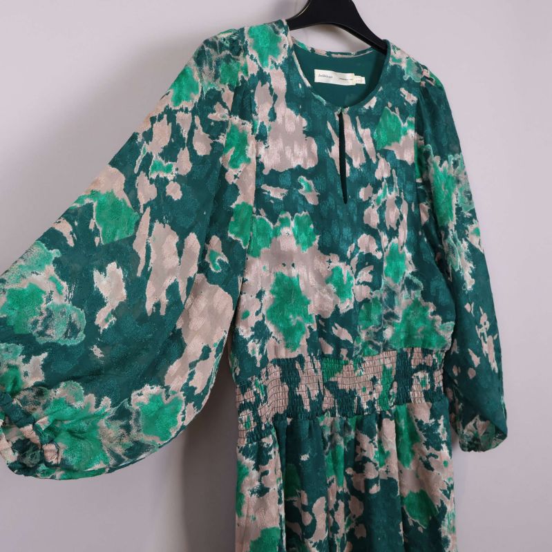 Detaljer av mönster och ärm