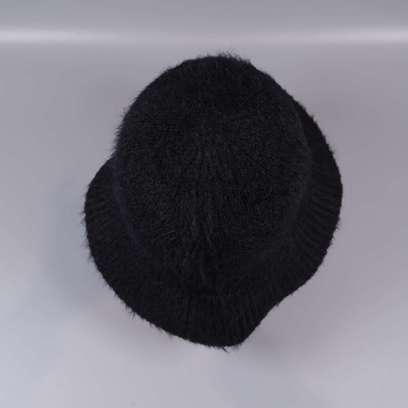 Hatten fotad ovanifrån visar struktur och rundad topp