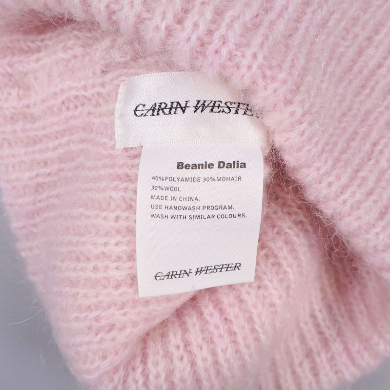 Materialetikett visar Carin Wester och materialmix