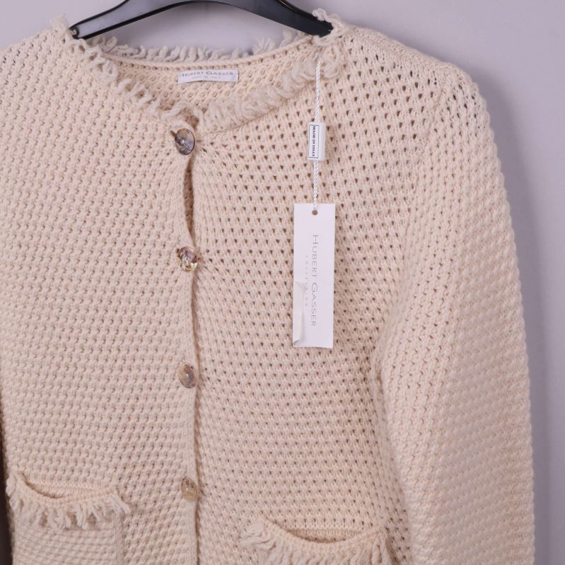 Detaljer av knappar och fickor