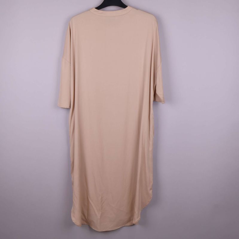 Skjortans nederdel med fläckar