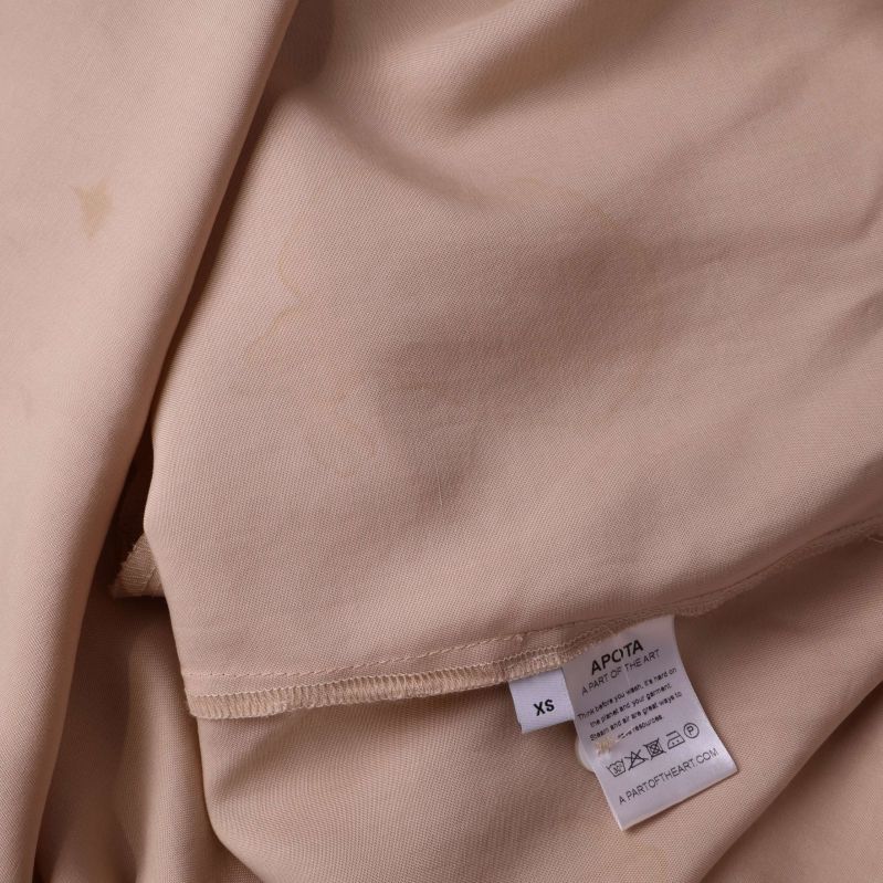 Fläckar på tyg och tvättlapp