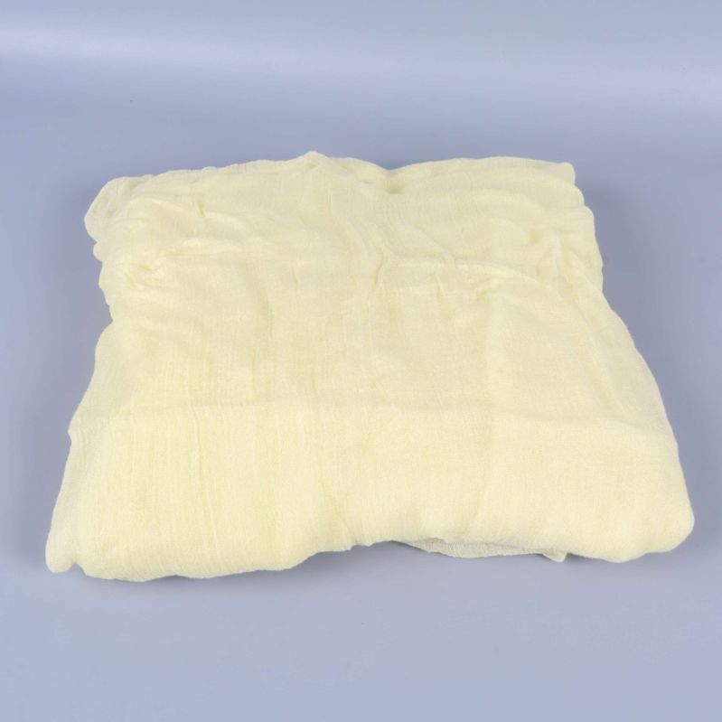 Ljusgul sjal utsträckt