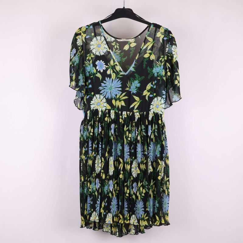 Framifrån med blommönster