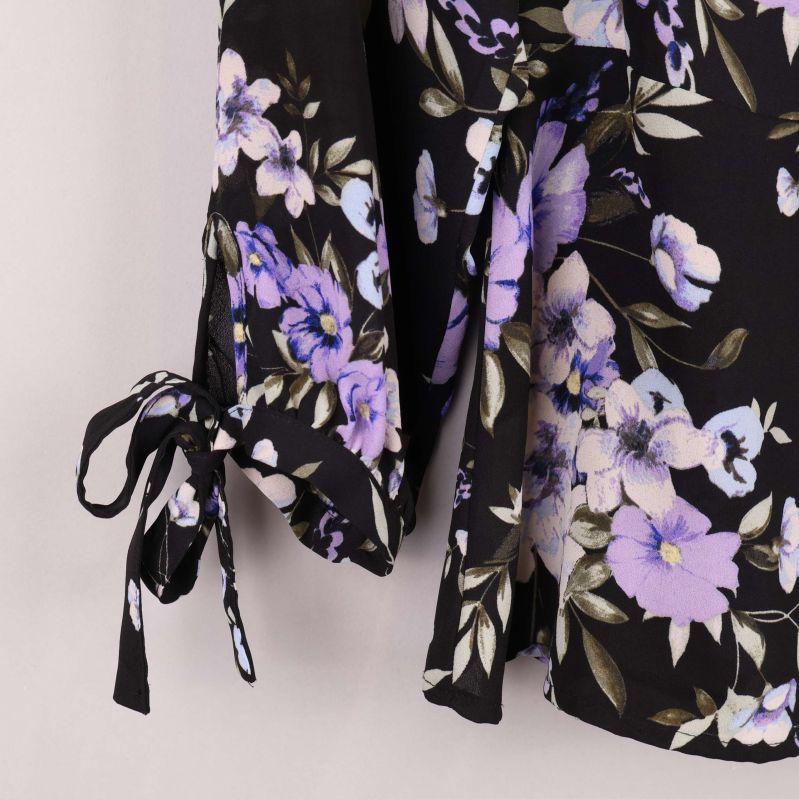 Knytband på blusärm