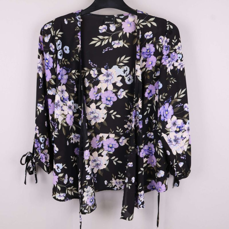 Öppen blus med blommönster