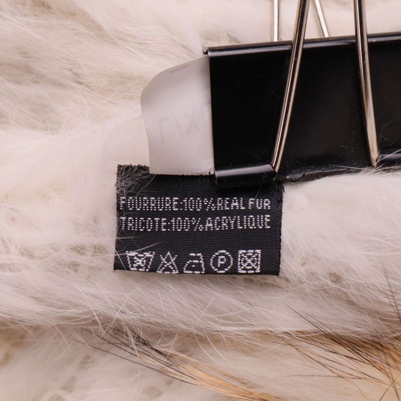 Materialetikett visar real fur och akrylfoder