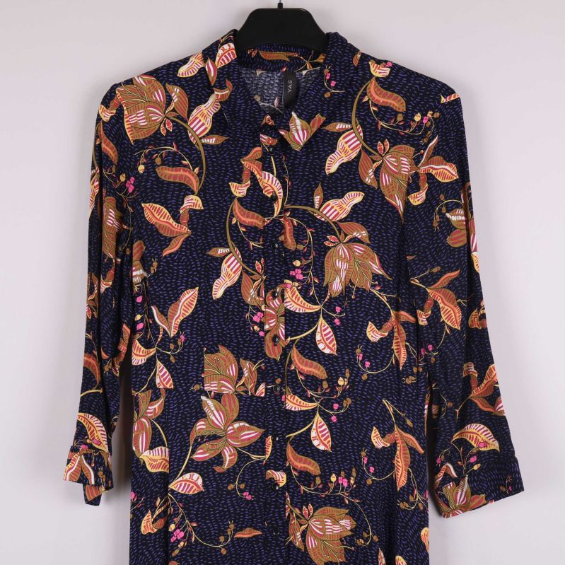 Etikett med designer och H&M