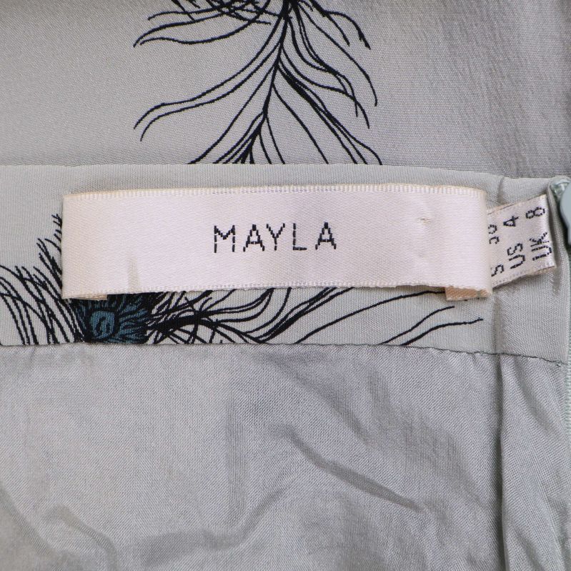 Närbild på tyglabel från Mayla på kjolens insida