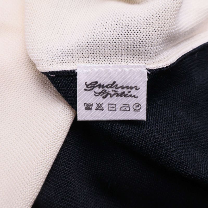 Tvätt- och skötselrådsetikett från Gudrun Sjödén