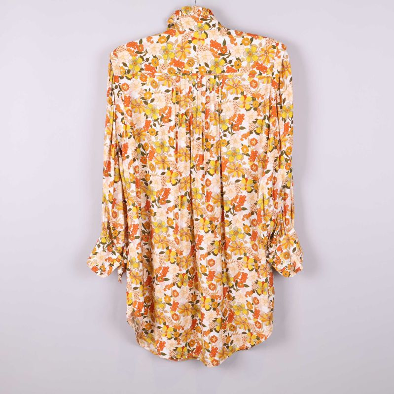 Baksida av långskjorta