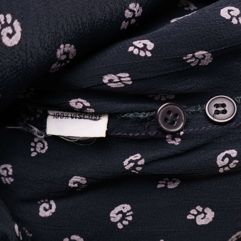 Materiallapp med texten 100% viskos