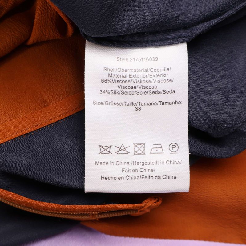 Materiallapp visar 66% viskos och 34% silke