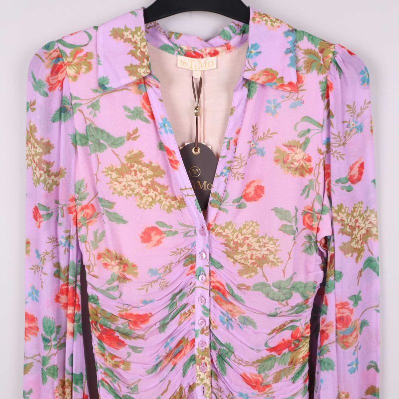 Detalj av knäppning framtill