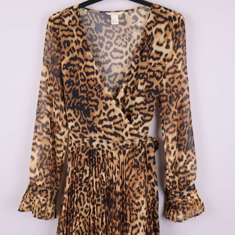 Detalj av omlott och V-ringning