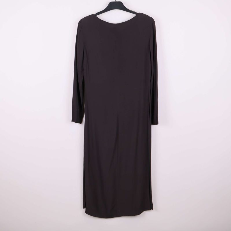 Baksida på klänning med lång ärm