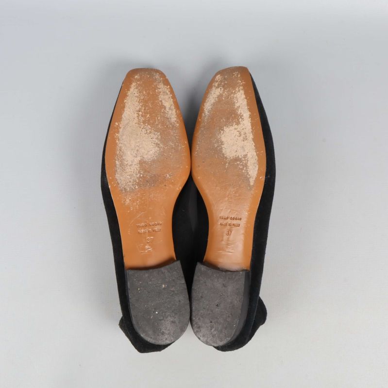 Slitna sulor på mockasiner