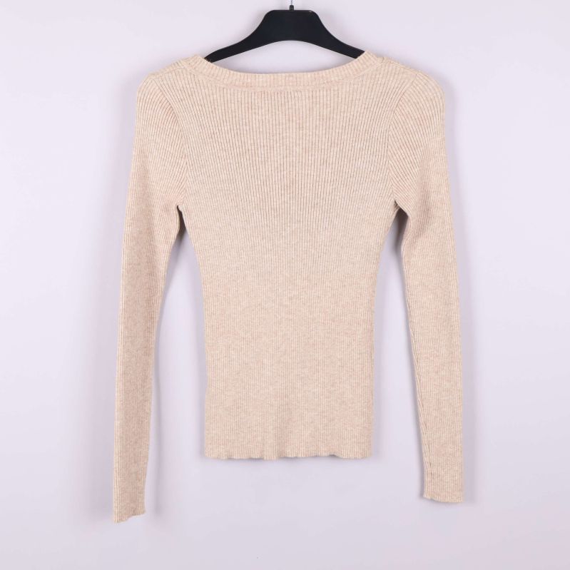 Baksida ribbstickad tröja