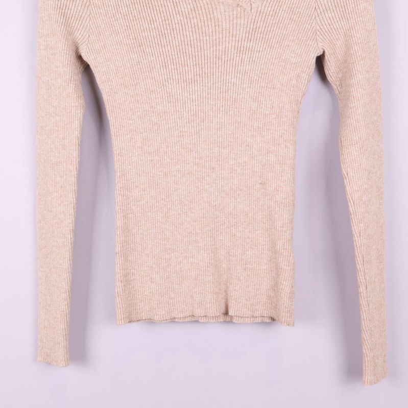 Detalj av tröjans nederkant