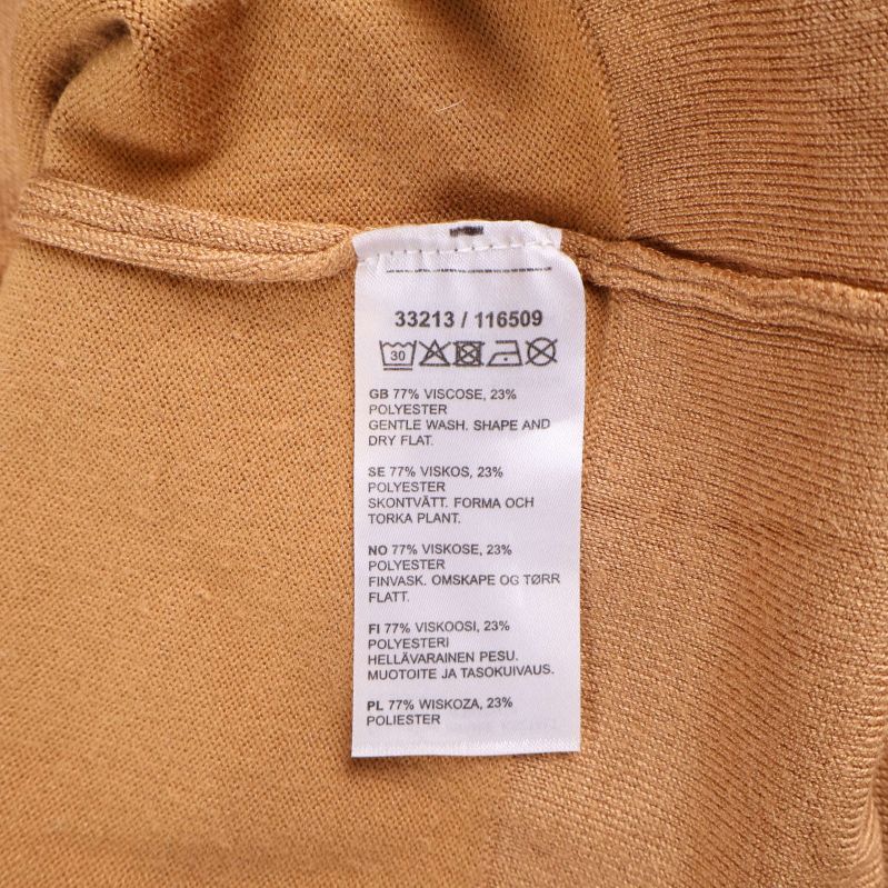 Materialinformation på tröjans etikett