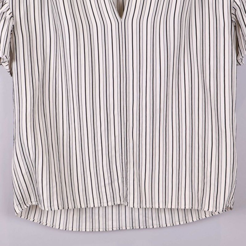 Framifrån med V-ringning